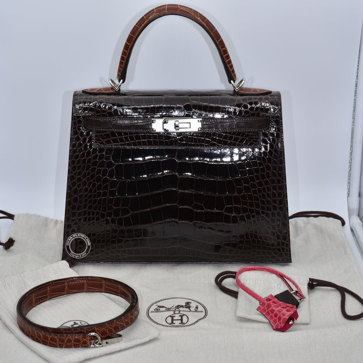 Hermès Kelly 28cm Ebene/Macassar/Miel Shiny Alligator PHW