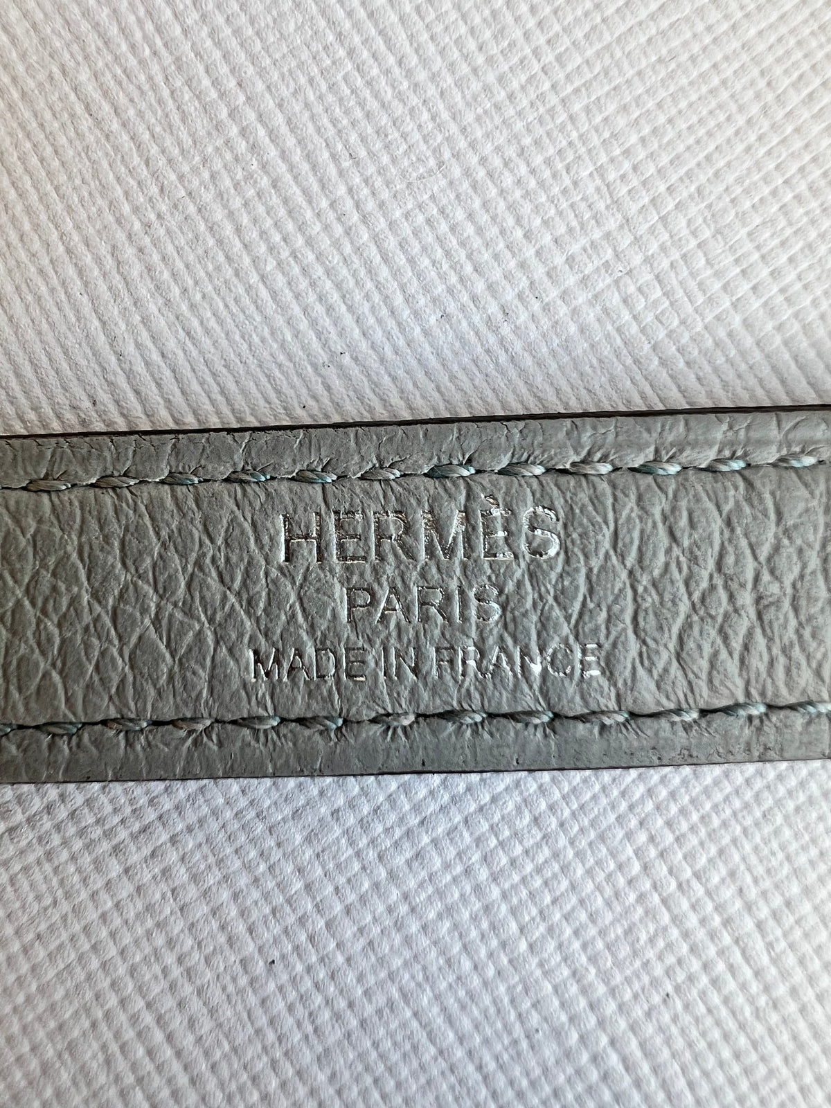 Shoulder strap stamp
